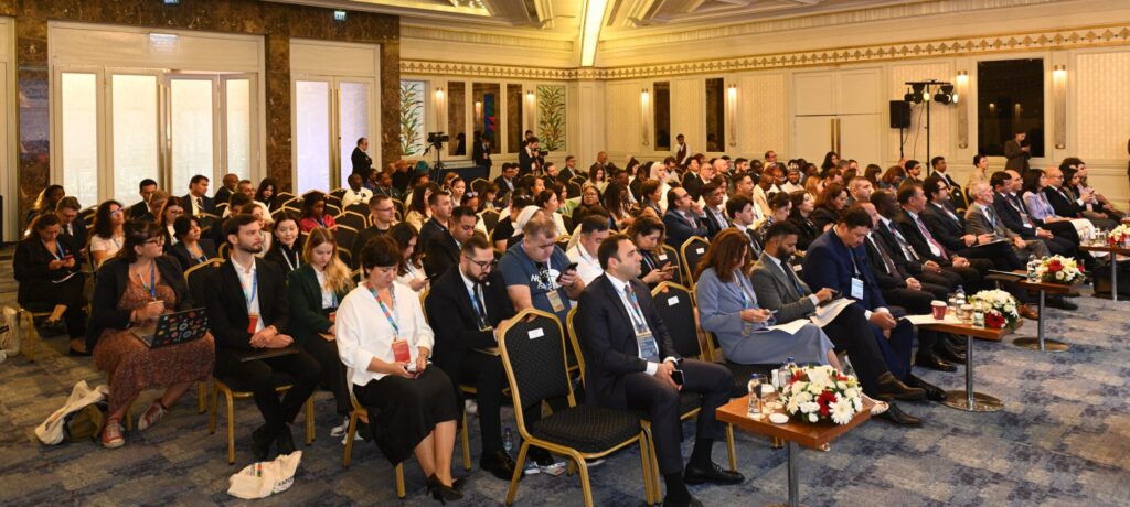 A wide-angle view of the full conference hall showing all international participants gathered for the Cleantech Days 2025 forum in Istanbul