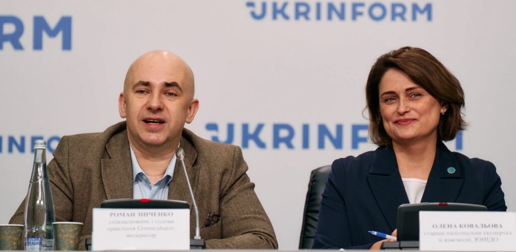 Roman Zinchenko, co-founder of Greencubator, and Olena Kovalova from UNIDO during the discussion at the panel table.